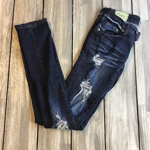 Machine Distressed Blue Jeans
